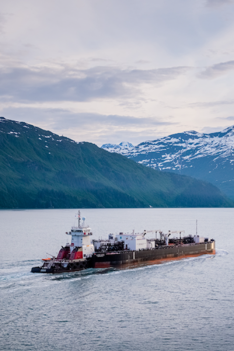 Crowley shipping vessel crossing the water
